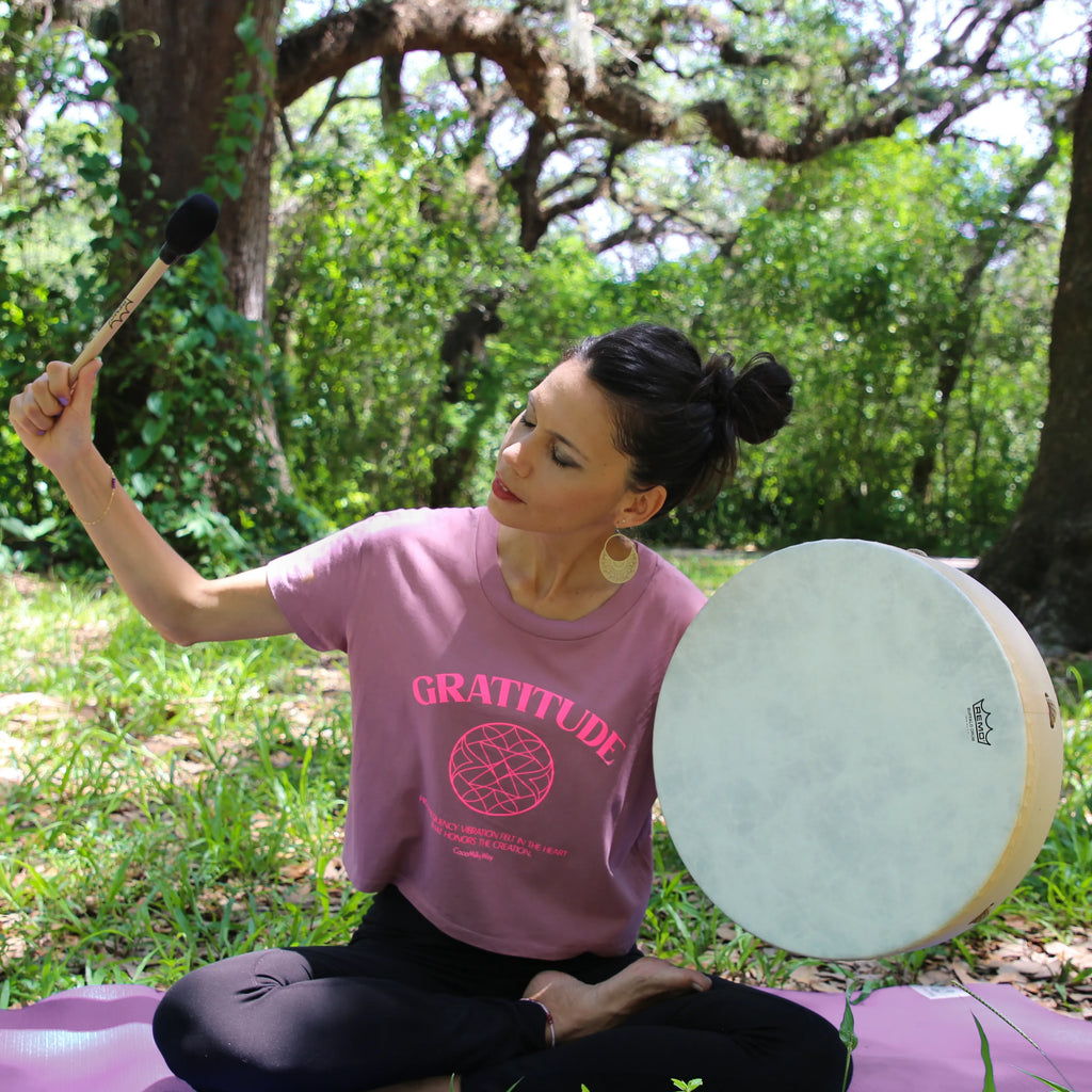 Shaman Woman playing drum in the wood Gratitude Crop Top by CocoMilkyWay