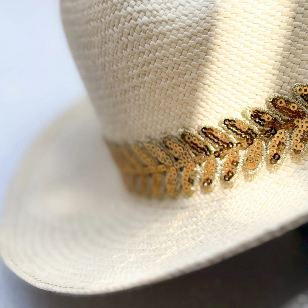 Close-up of a natural boho hat with gold sequin embellishments Spiritual Fashion by CocoMilkyWay