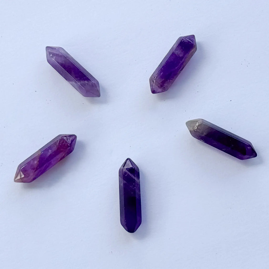 CocoMilkyWay crystal grid with amethyst crystal, a spiritual tool for dream manifestation