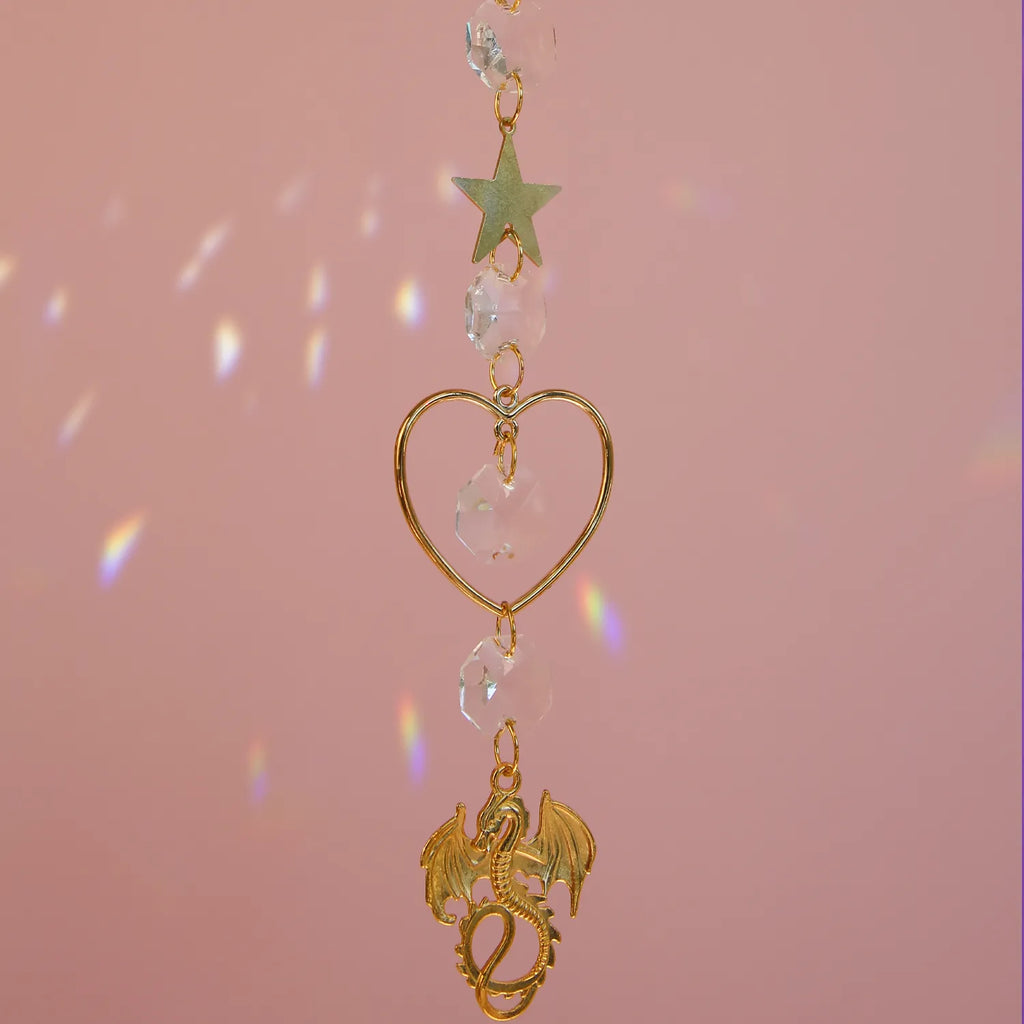 Dragon-themed child suncatcher by CocoMilkyWay, playful and magical window decor capturing light and imagination