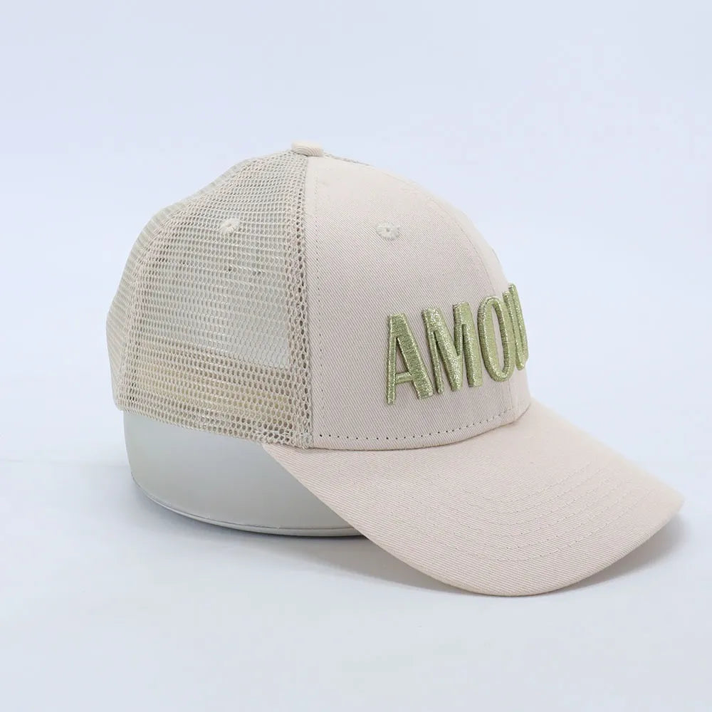 CocoMilkyWay Amour trucker hat, glitter gold embroidered statement piece with a touch of love