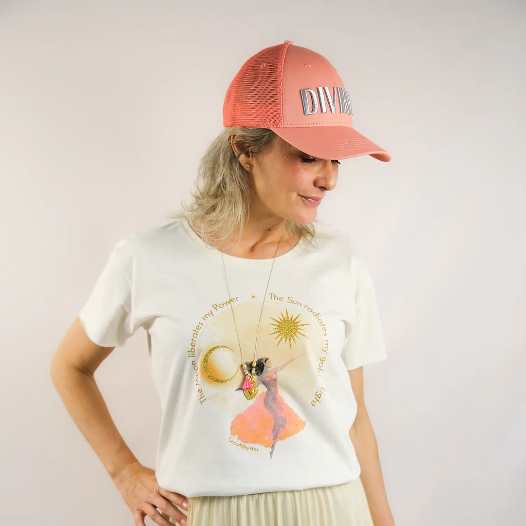 Embroidered divine silver and pink trucker hat by CocoMilkyWay, styled with fairy t-shirt for a dreamy, high-frequency look