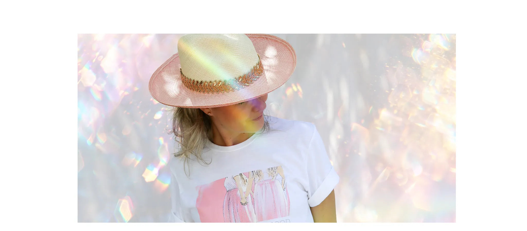 CocoMilkyWay Sisterhood t-shirt with pink glitter straw hat, gentle, high-vibe styling for sacred feminine connection