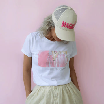 Sisterhood t-shirt paired with Magic embroidered trucker hat by CocoMilkyWay, a radiant outfit celebrating connection and personal style